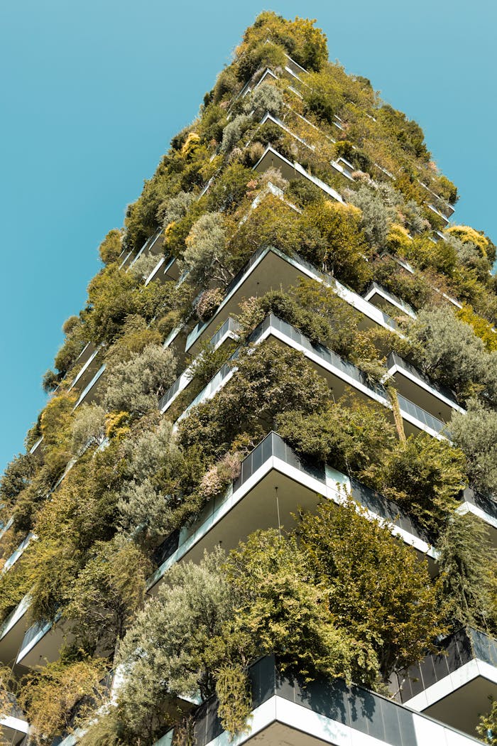 about-img Stunning view of Milan's Bosco Verticale, covered in lush greenery.