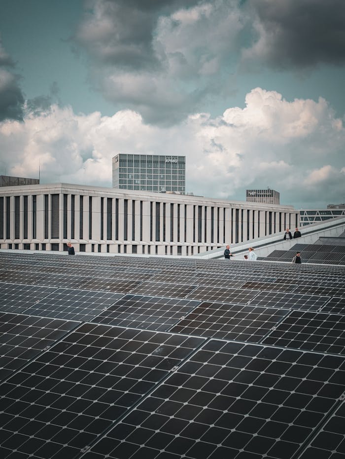 contact-img View of modern architecture and solar panels in Berlin, showcasing sustainable energy solutions.